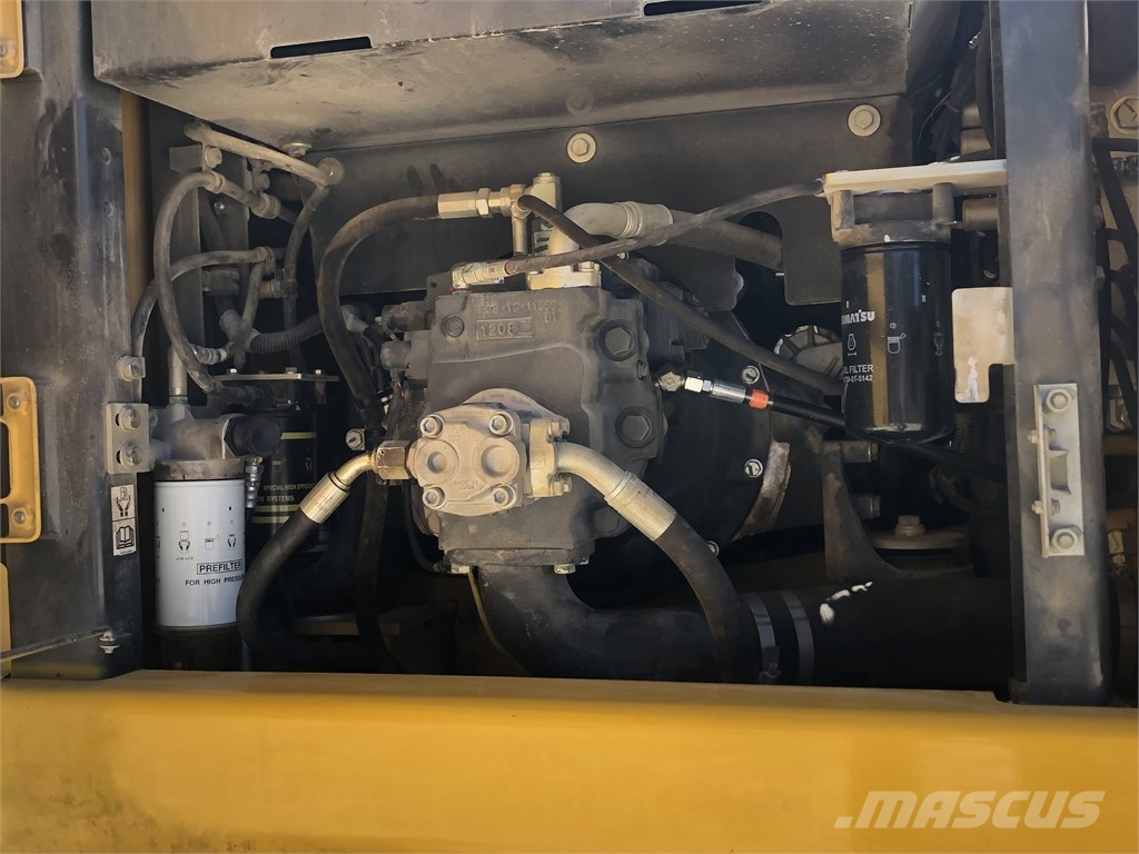 Komatsu PW 180-11 Lastik tekerli ekskavatörler