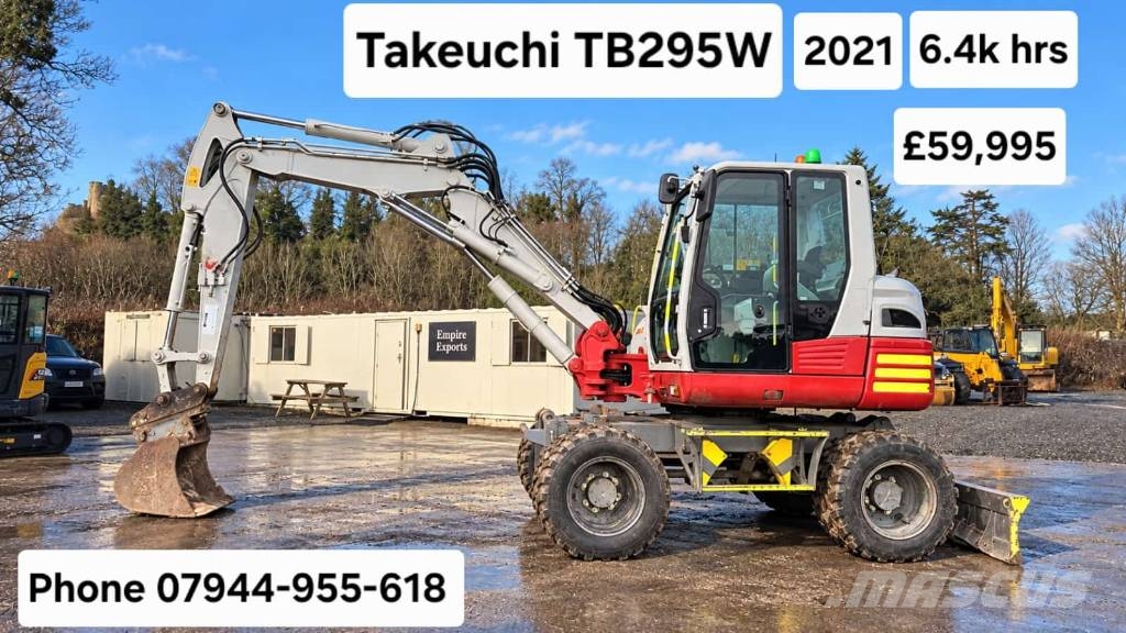 Takeuchi TB 295 W حفارات بعجل