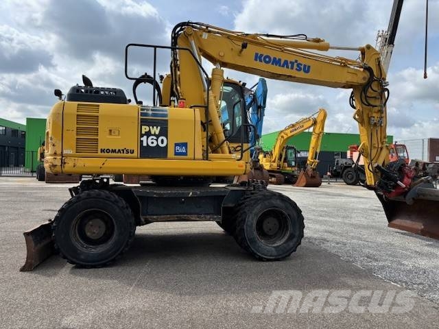 Komatsu PW 160 حفارات بعجل