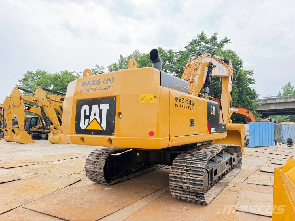 CAT 345D Гусеничні екскаватори