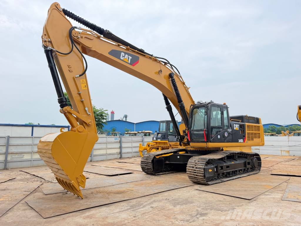 CAT 345D Гусеничні екскаватори