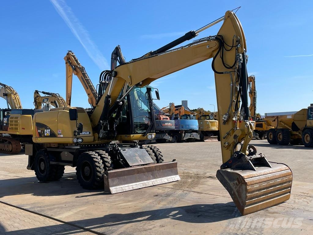 CAT M313D VA - Outriggers + Blade Excavadoras de ruedas