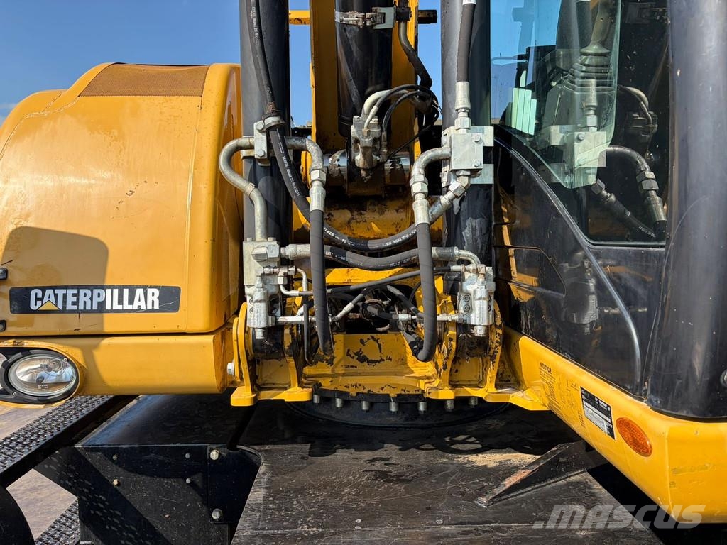 CAT M313D VA - Outriggers + Blade Excavadoras de ruedas