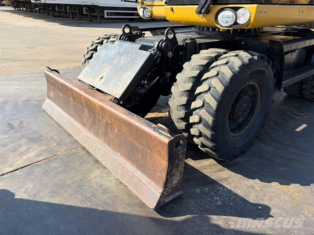 CAT M313D VA - Outriggers + Blade Excavadoras de ruedas