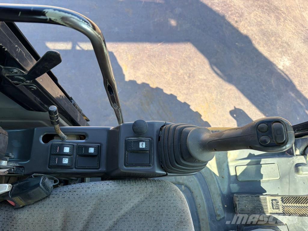 CAT M313D VA - Outriggers + Blade Excavadoras de ruedas