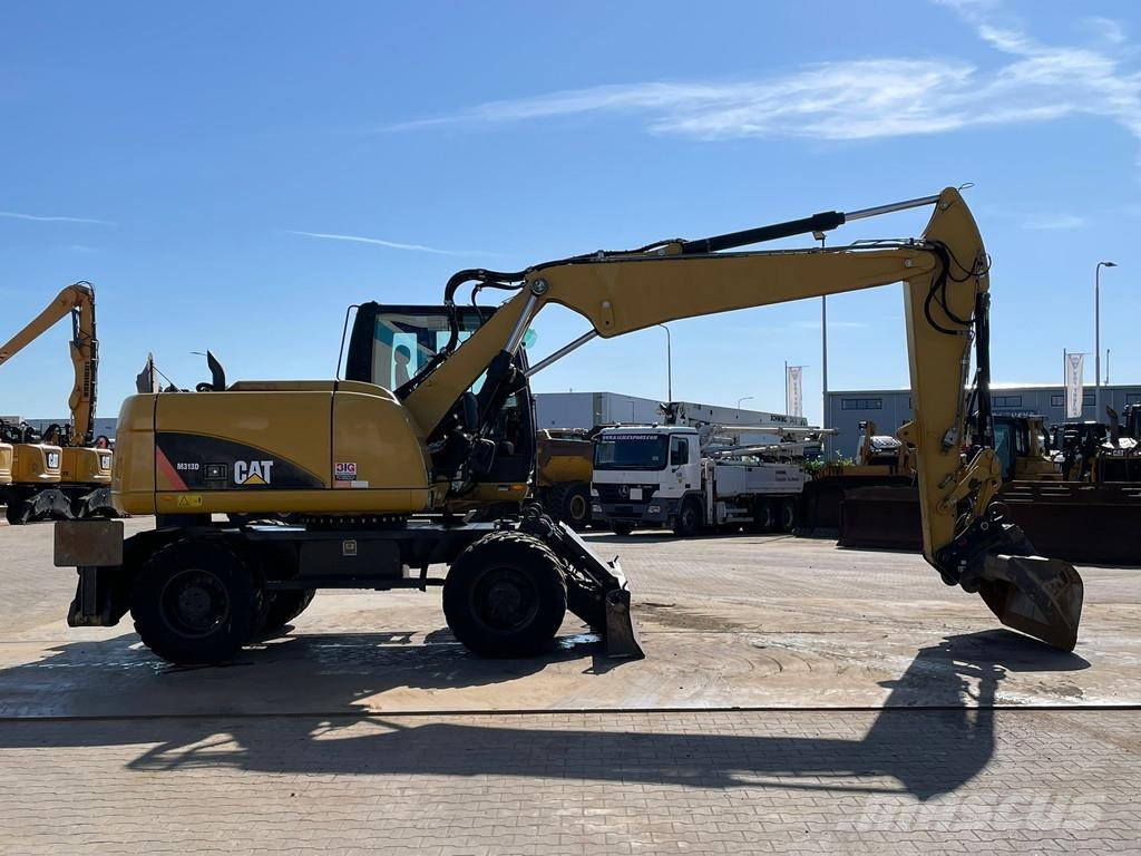 CAT M313D VA - Outriggers + Blade Excavadoras de ruedas