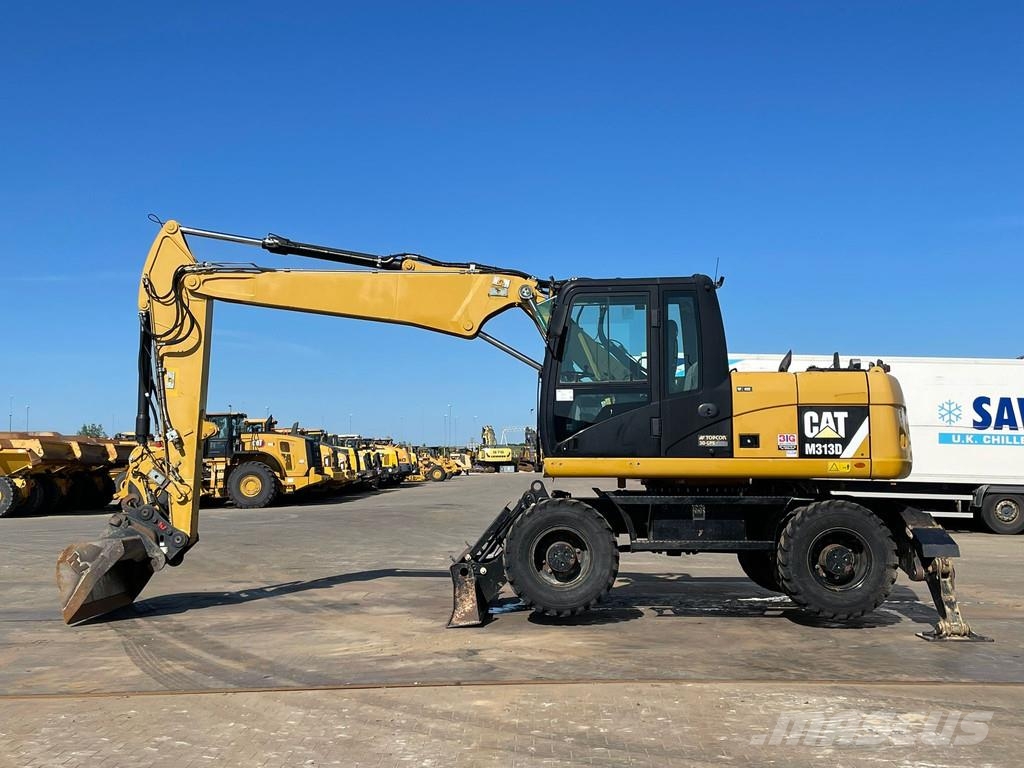 CAT M313D VA - Outriggers + Blade Excavadoras de ruedas