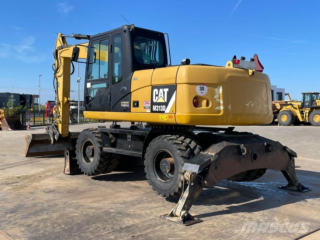 CAT M313D VA - Outriggers + Blade Excavadoras de ruedas