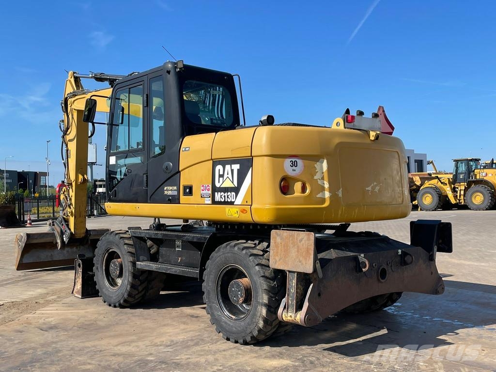 CAT M313D VA - Outriggers + Blade Excavadoras de ruedas