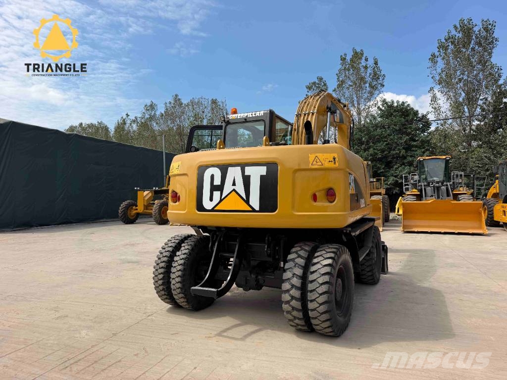 CAT M 320 Bageri na kotačima