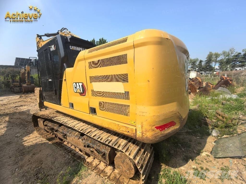 CAT 323 Beltegraver