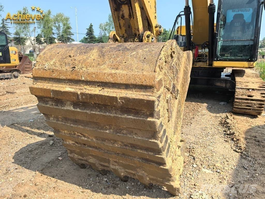 CAT 323 Beltegraver