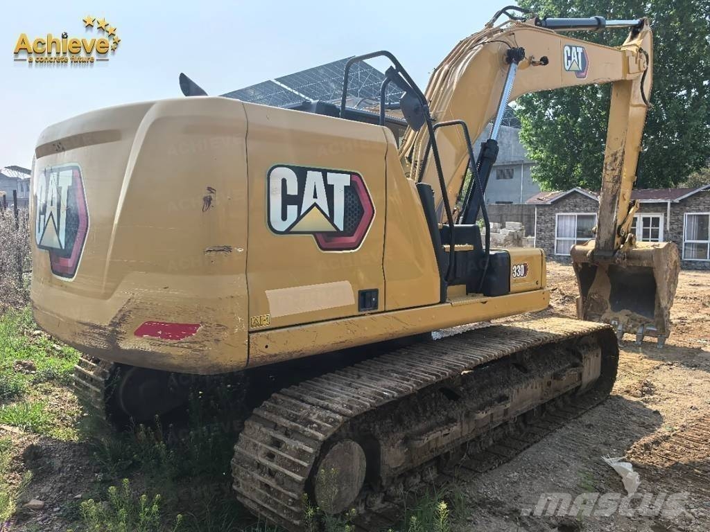 CAT 323 Beltegraver