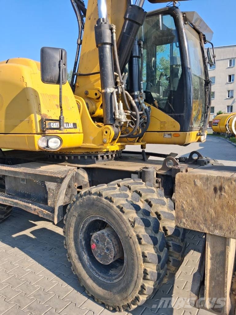 CAT M 322 D Wielgraafmachines
