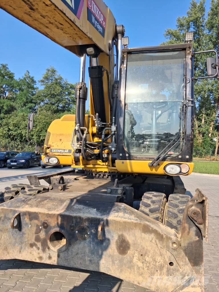CAT M 322 D Wielgraafmachines