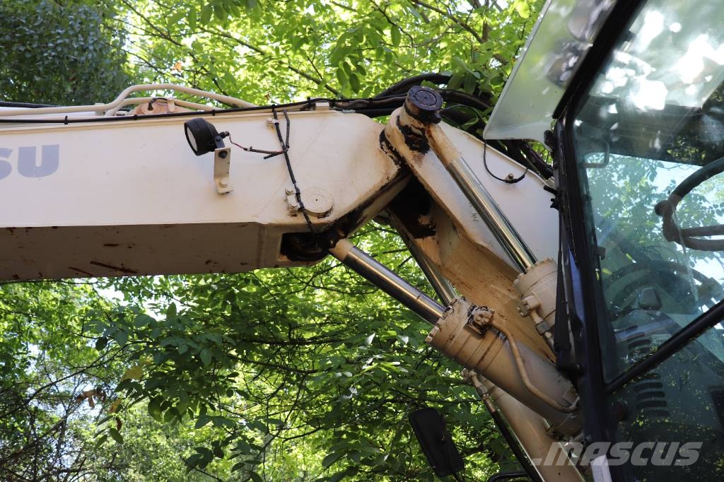 Komatsu PW 140-7 Retroescavadoras