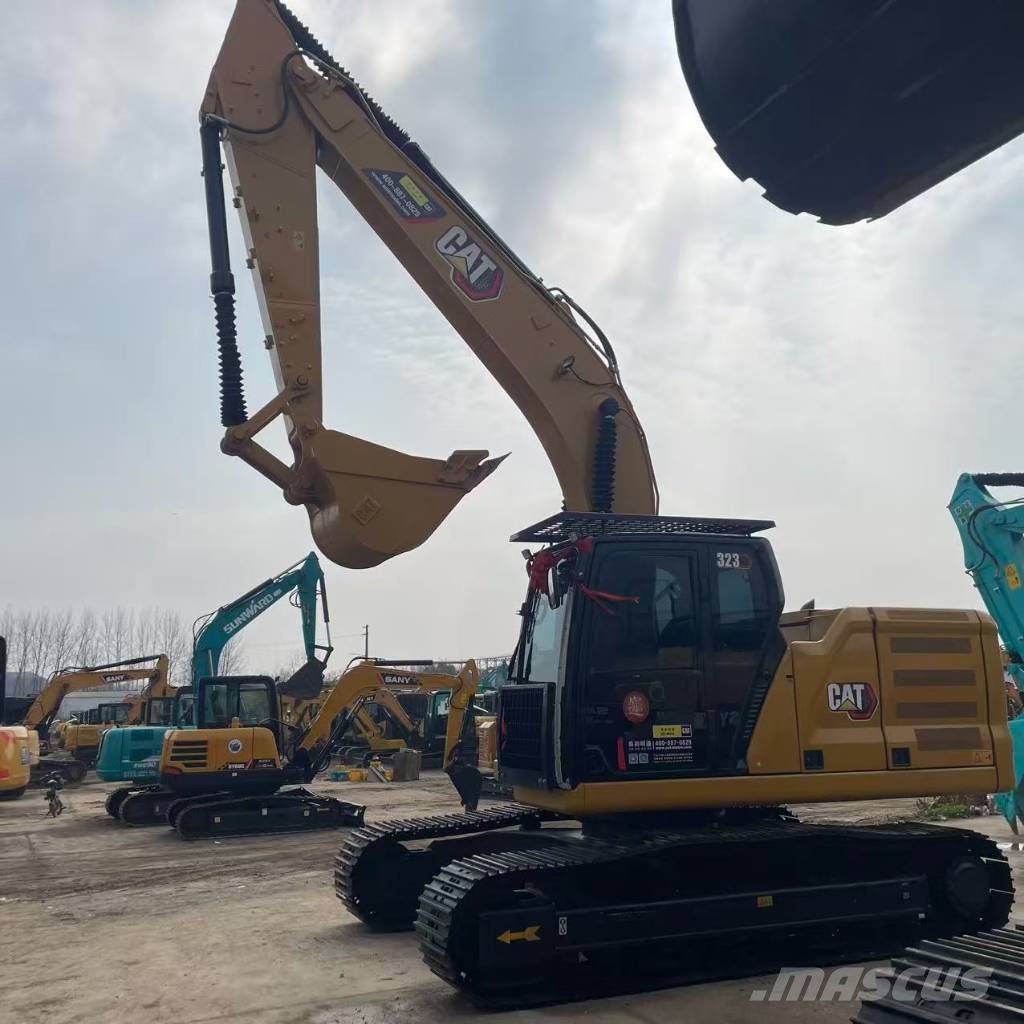 CAT 323 Vikšriniai ekskavatoriai
