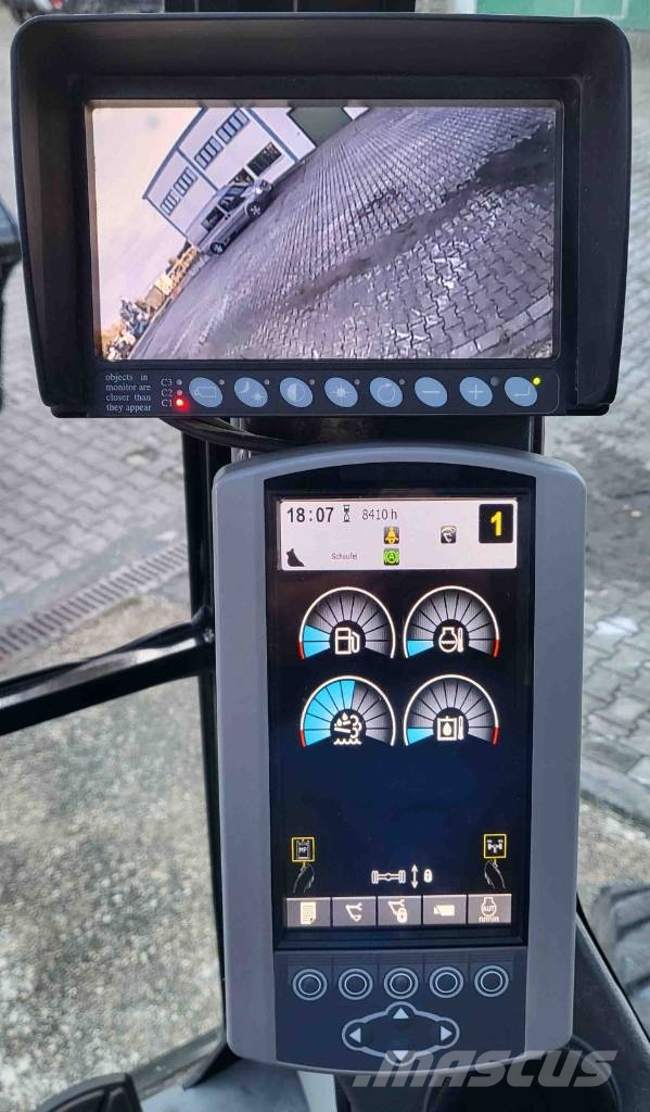 CAT M 318 F حفارات بعجل