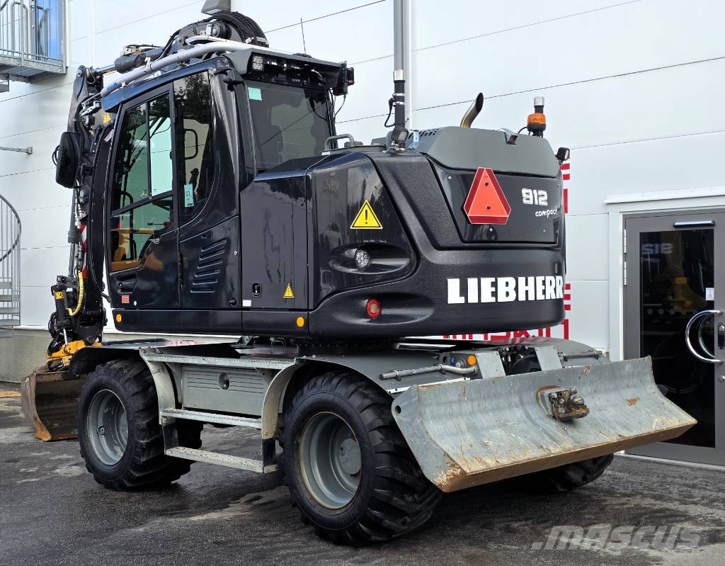 Liebherr 912 med vagn & grävsystem Rupsgraafmachines