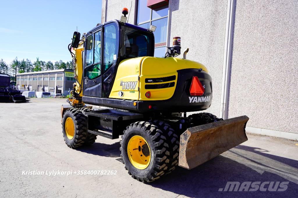 Yanmar B110W ENGCONILLA حفارات بعجل