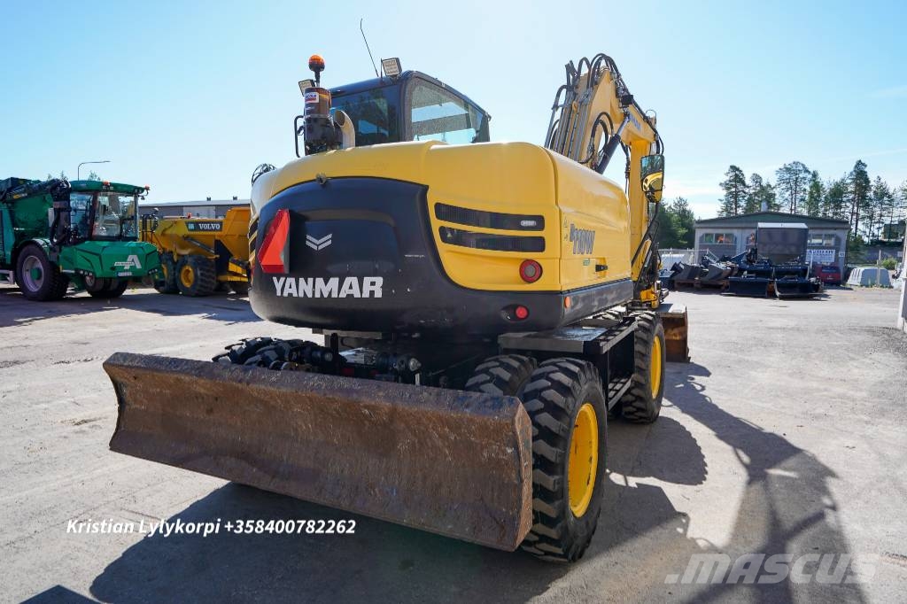 Yanmar B110W ENGCONILLA حفارات بعجل