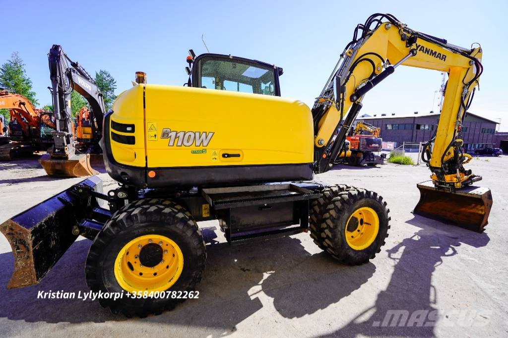 Yanmar B110W ENGCONILLA حفارات بعجل