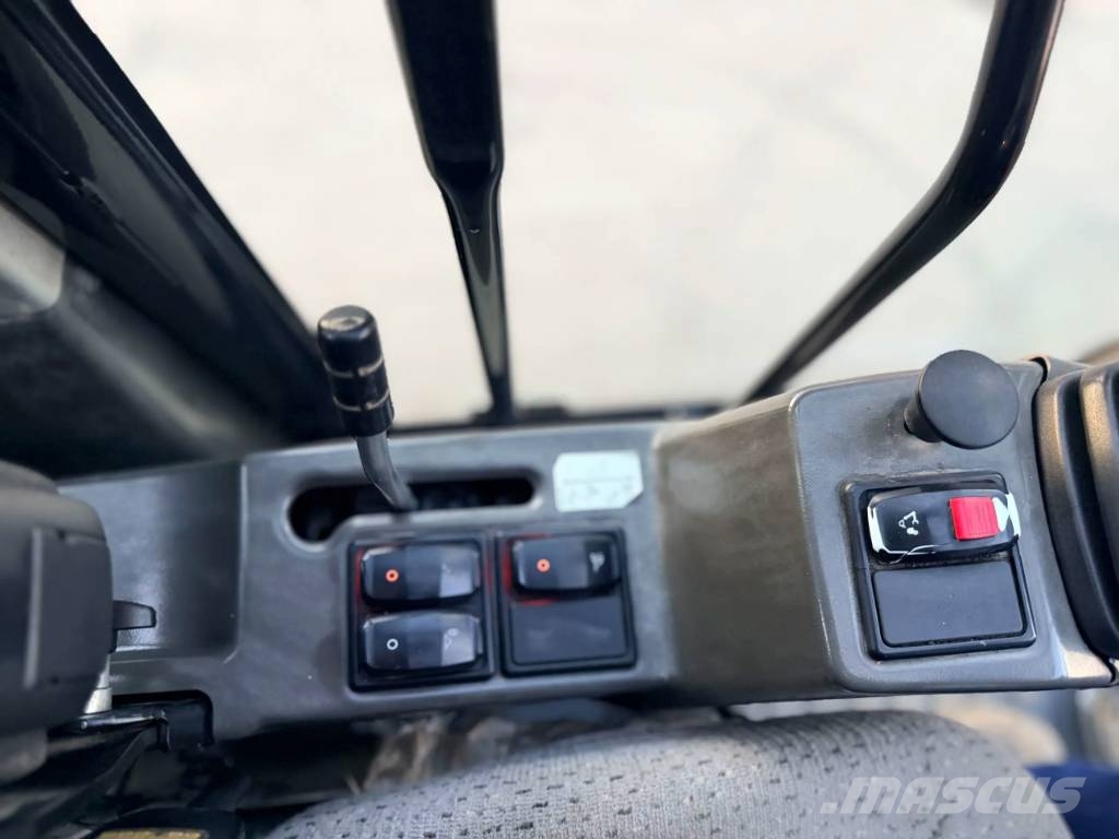 CAT M315F Pelle sur pneus