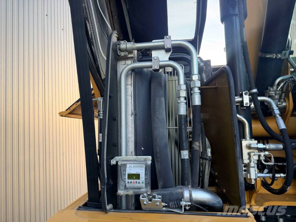 CAT M315F Pelle sur pneus