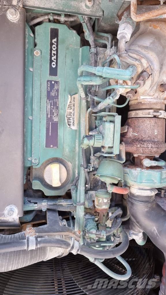 Volvo EW 140 D حفارات بعجل