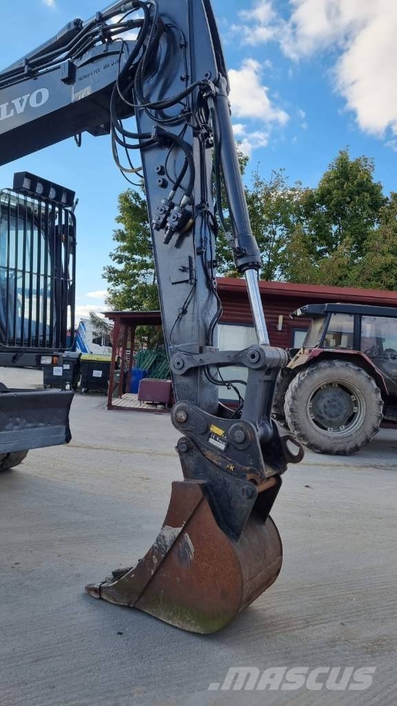 Volvo EW 140 D حفارات بعجل