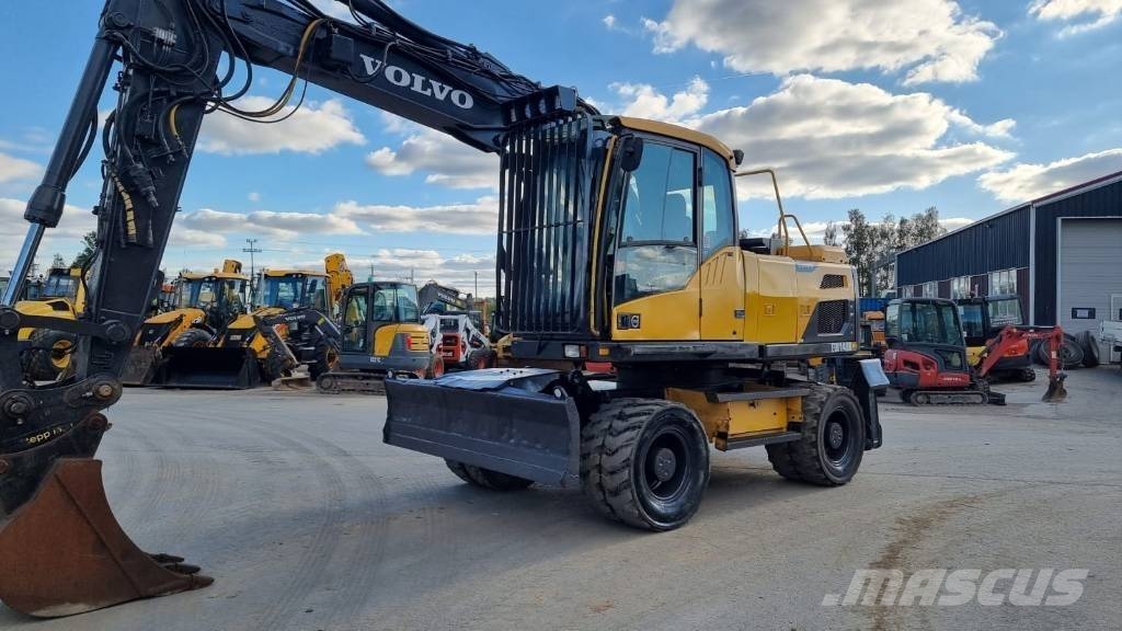 Volvo EW 140 D حفارات بعجل