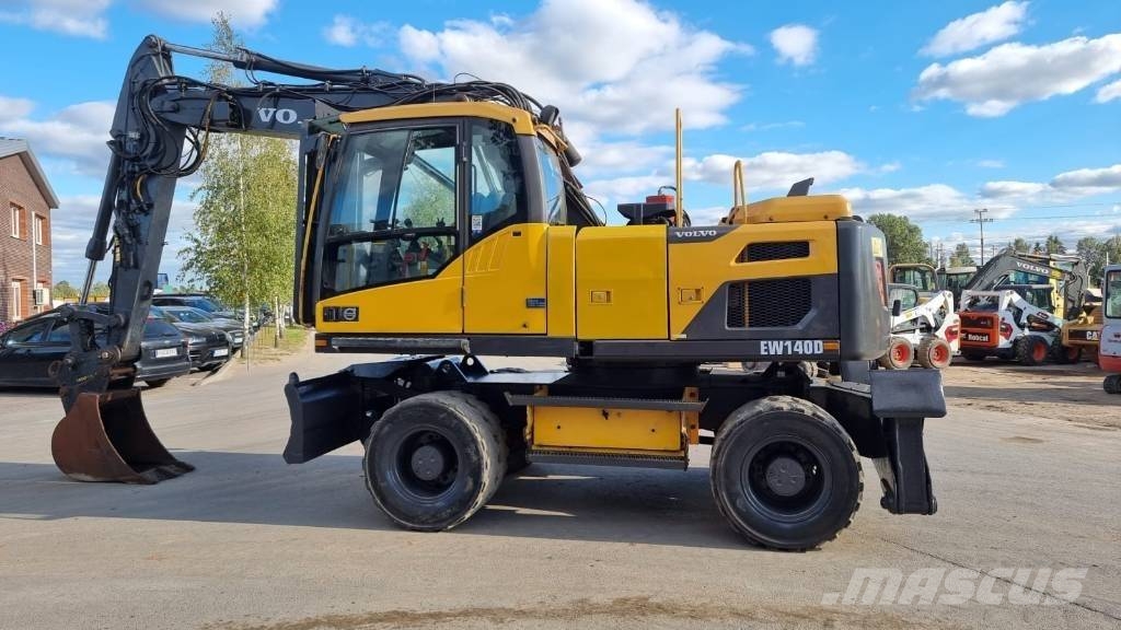 Volvo EW 140 D حفارات بعجل