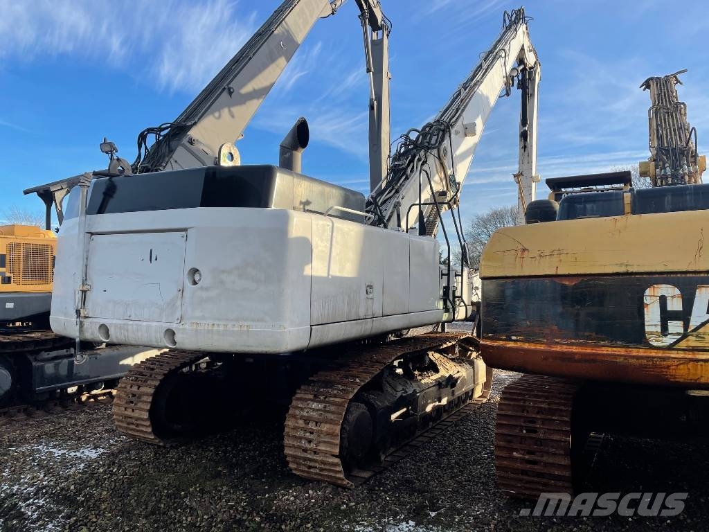 CAT 345C UHD High Reach Demolition 28 m Griovimo ekskavatoriai