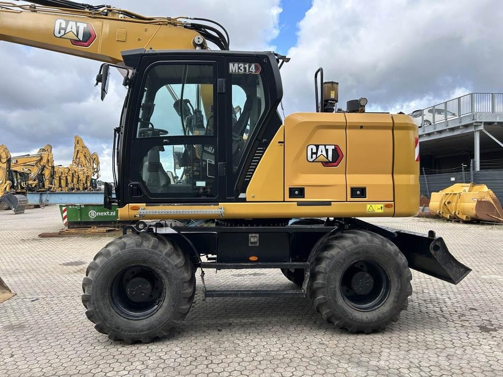 CAT M314-07 Bagri na kolesih