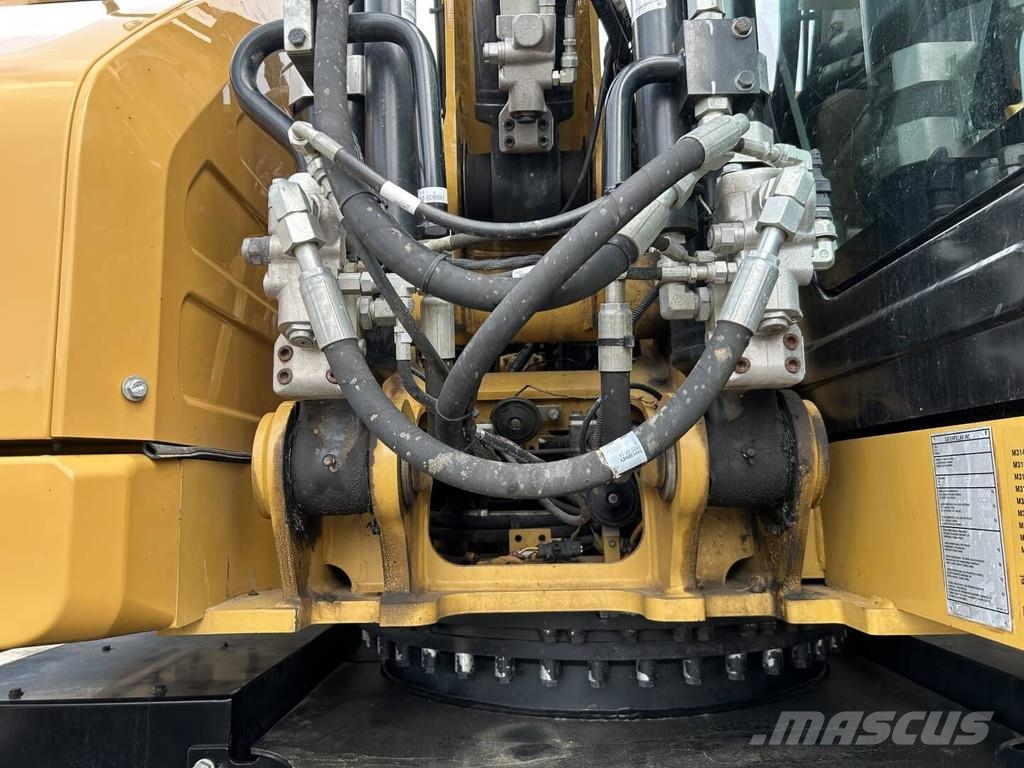 CAT M314-07 Bagri na kolesih