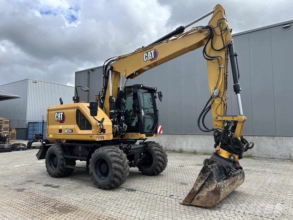 CAT M314-07 Bagri na kolesih