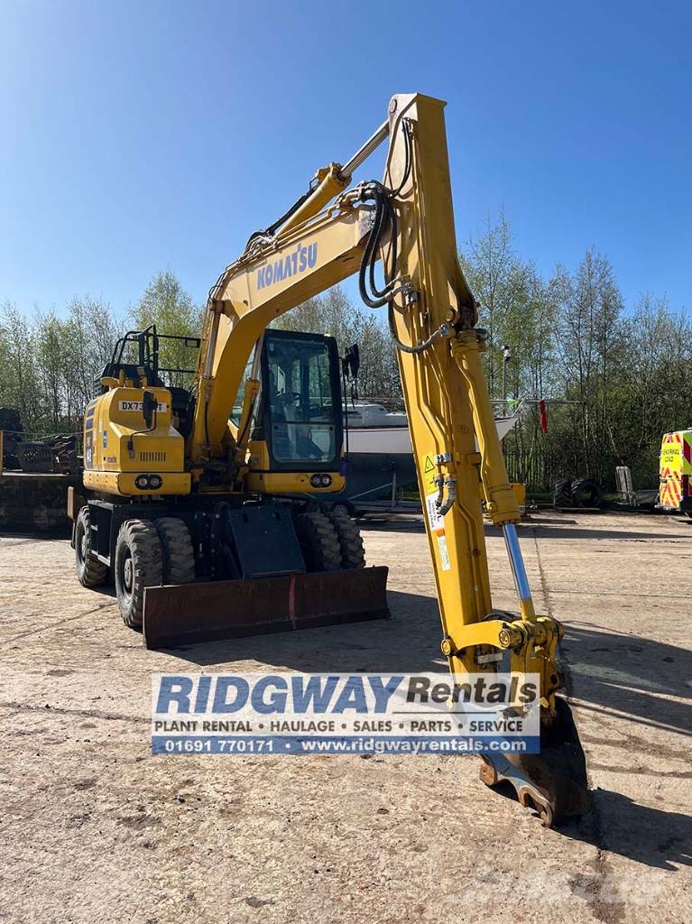 Komatsu PW 148-11 حفارات بعجل