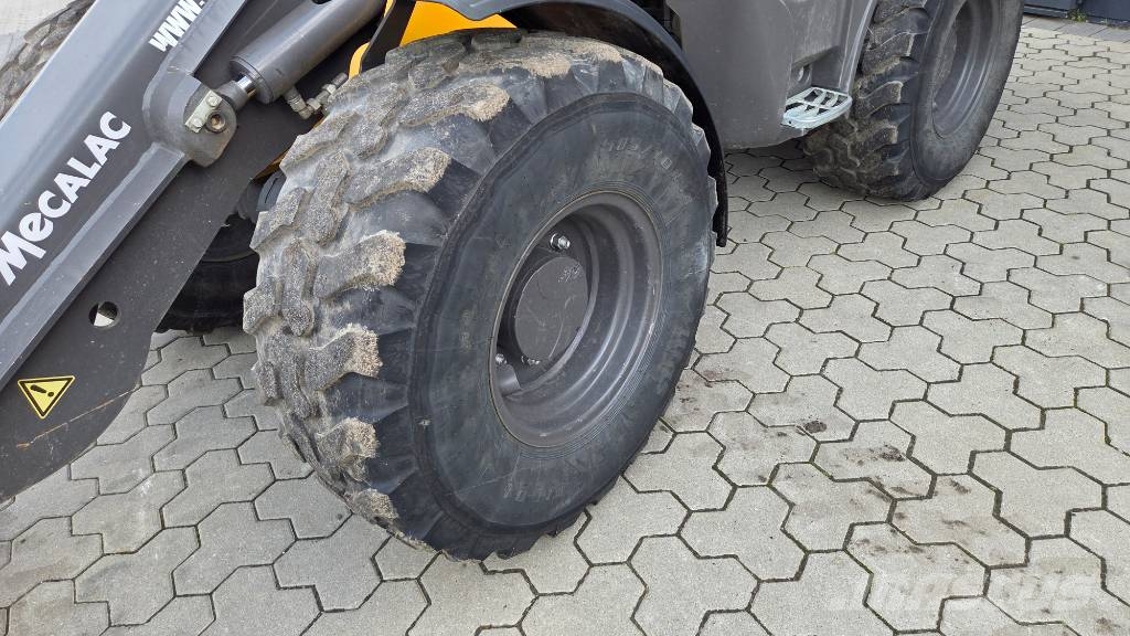 Mecalac AX 1000 لوادر بعجل