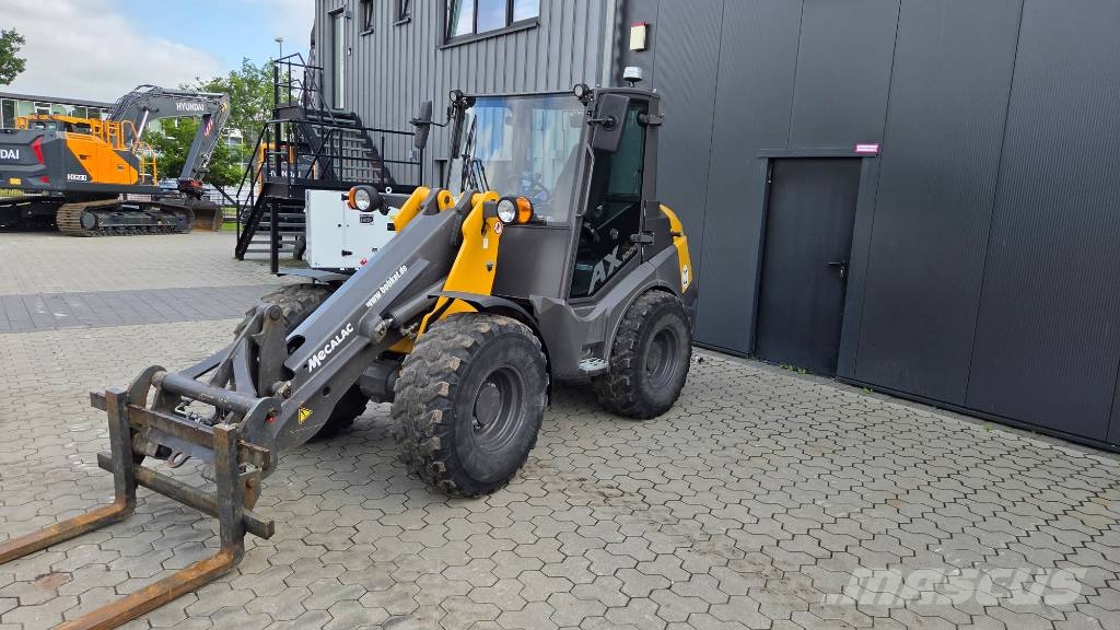 Mecalac AX 1000 لوادر بعجل