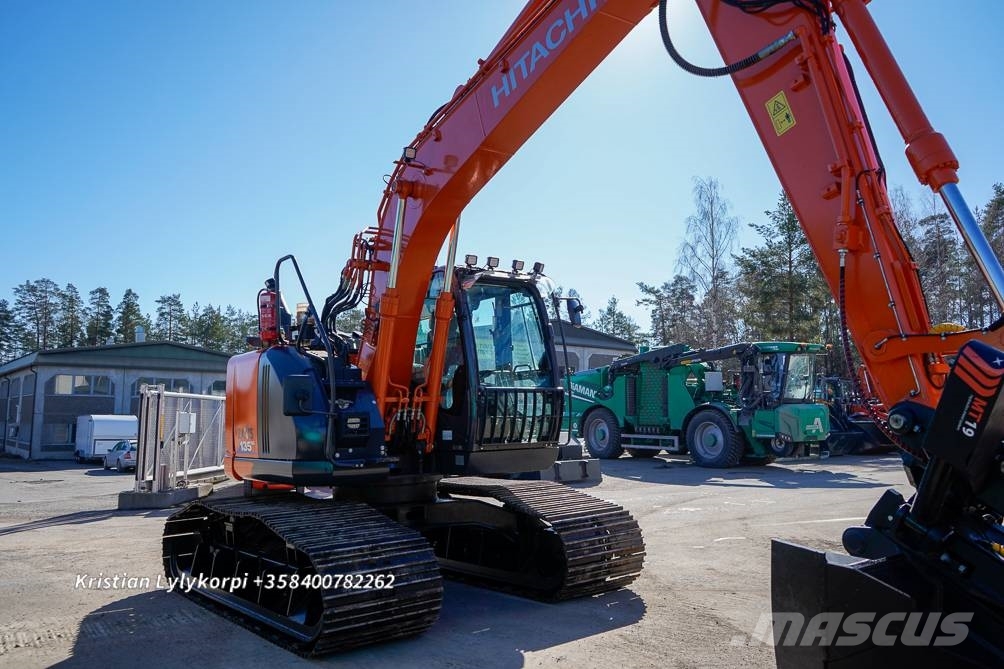 Hitachi ZX135US-6 METSÄALUSTALLA 履带挖掘机