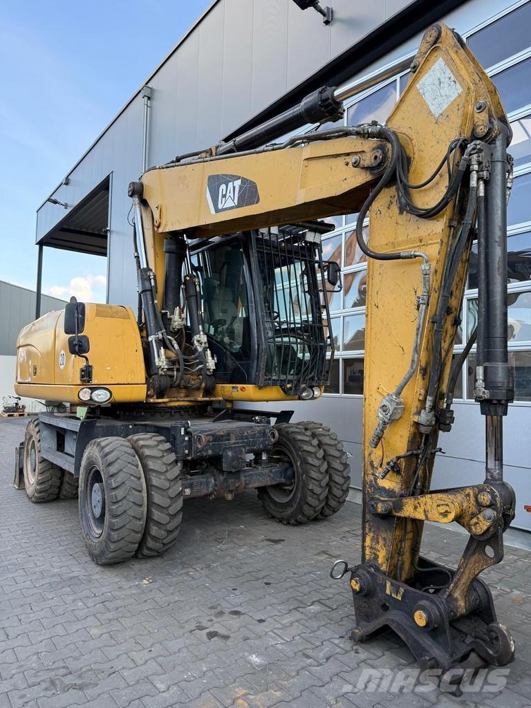 CAT M318D | A/C | German Machine! Bagri na kolesih