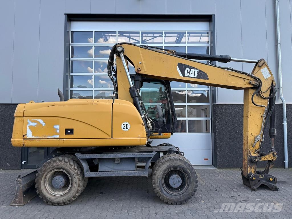 CAT M318D | A/C | German Machine! Bagri na kolesih