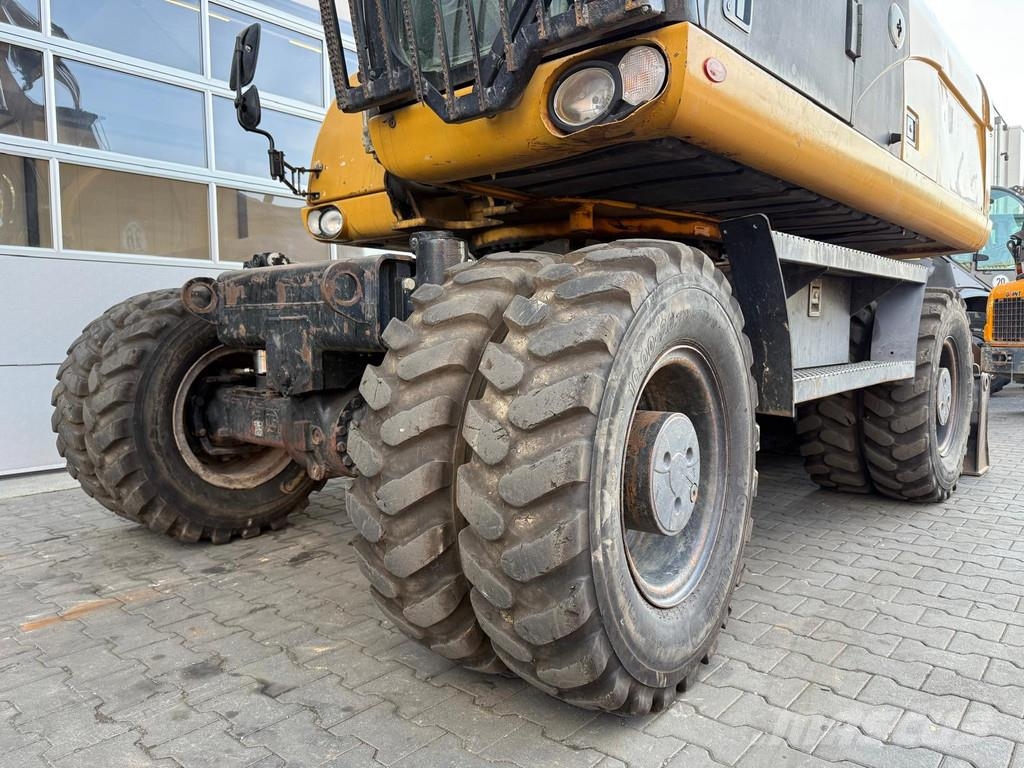 CAT M318D | A/C | German Machine! Bagri na kolesih