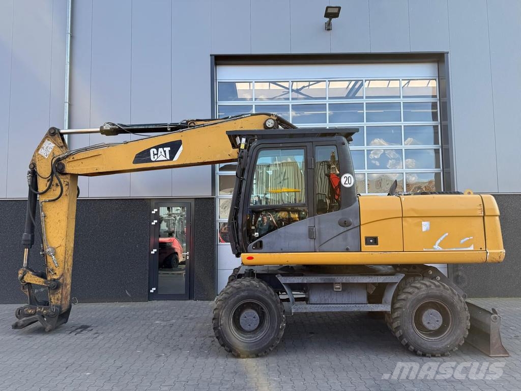 CAT M318D | A/C | German Machine! Bagri na kolesih