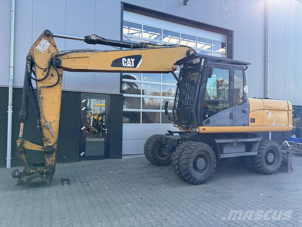 CAT M318D | A/C | German Machine! Bagri na kolesih