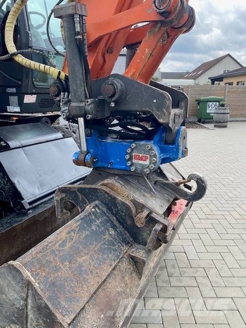 Hitachi ZX 140 W-6 حفارات بعجل