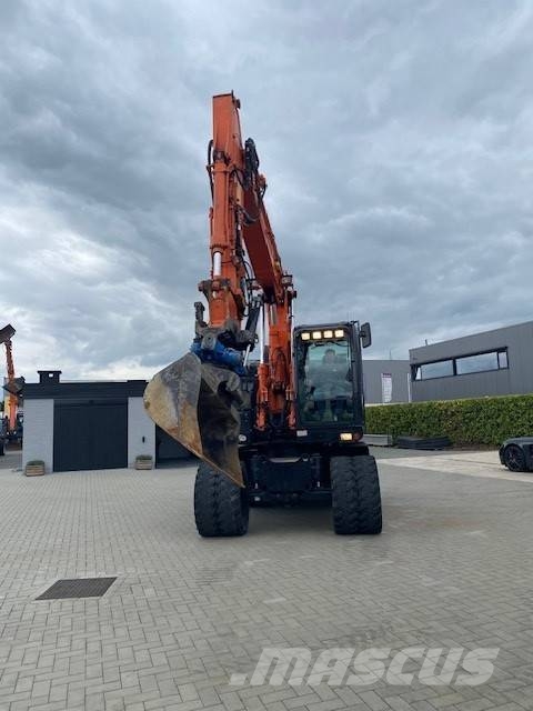 Hitachi ZX 140 W-6 حفارات بعجل