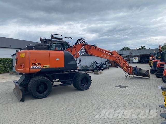 Hitachi ZX 140 W-6 حفارات بعجل