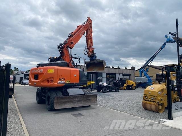 Hitachi ZX 140 W-6 حفارات بعجل