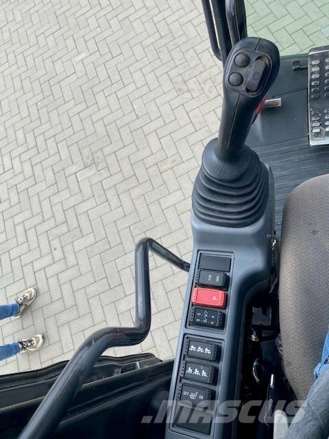 Hitachi ZX 140 W-6 حفارات بعجل